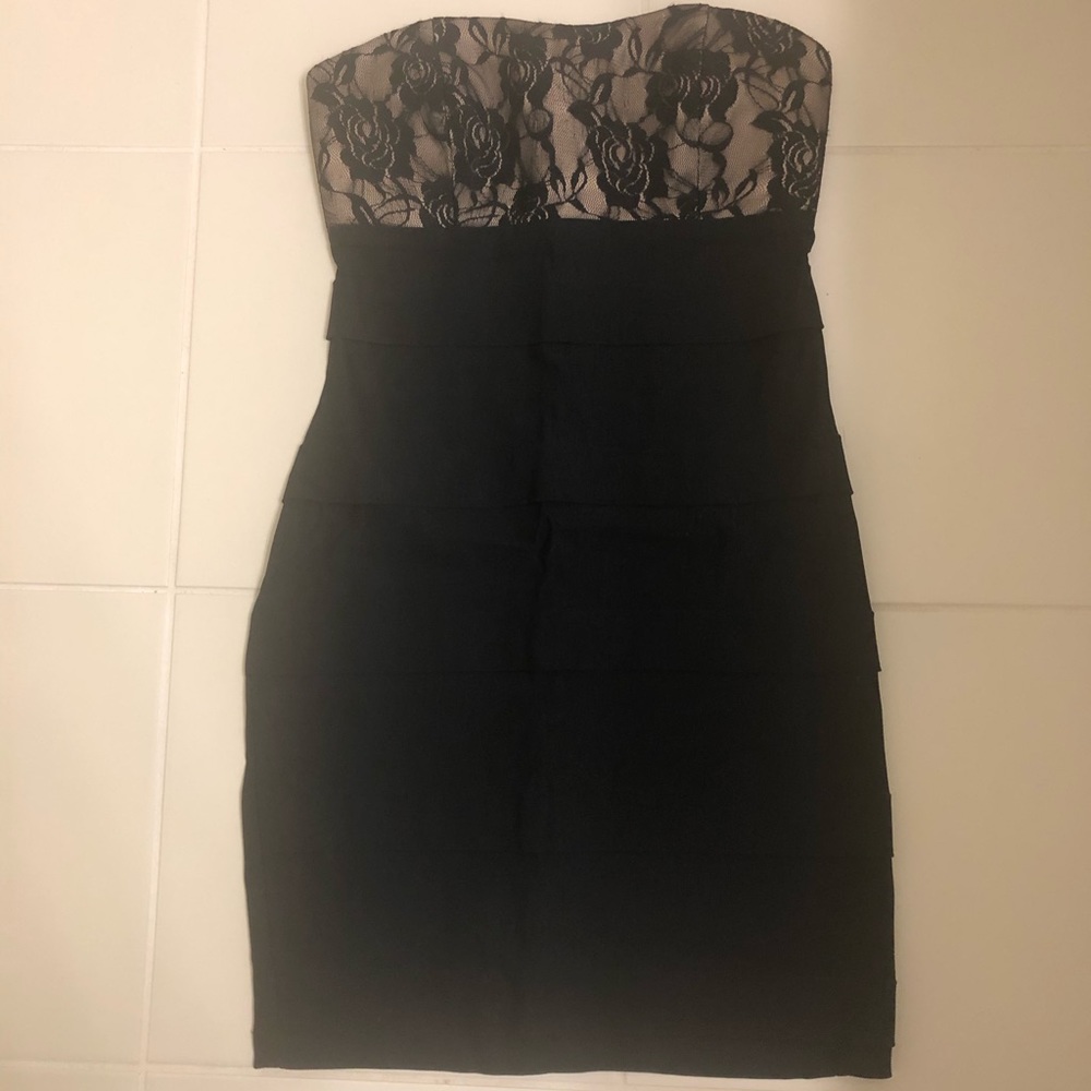 Black cocktail dress with lace detail